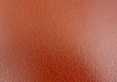 Crackle paint: aged leather effect with cracks. Tone on tone application.
